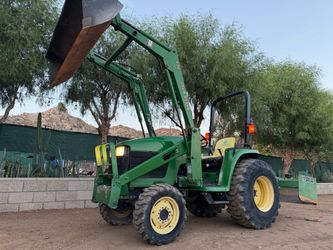 John Deere Loader tractor w attachments