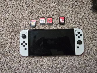 Nintendo Switch OLED with 4 Games