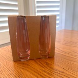 $3 - New set of 2 glass Stemless Champagne flutes. Color-Pink. Holds 7.8 fl oz.  Please pick up within 24 hours greatly appreciated.  Thank you!