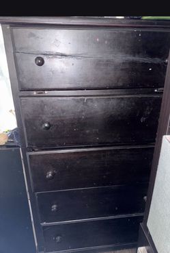 Tall black dresser