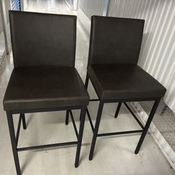 2 Black leather bar/counter Stools