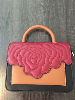 Aristotle rose bag