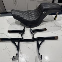 M8 Softail Crash Bars & Saddleman Step Up Seat  