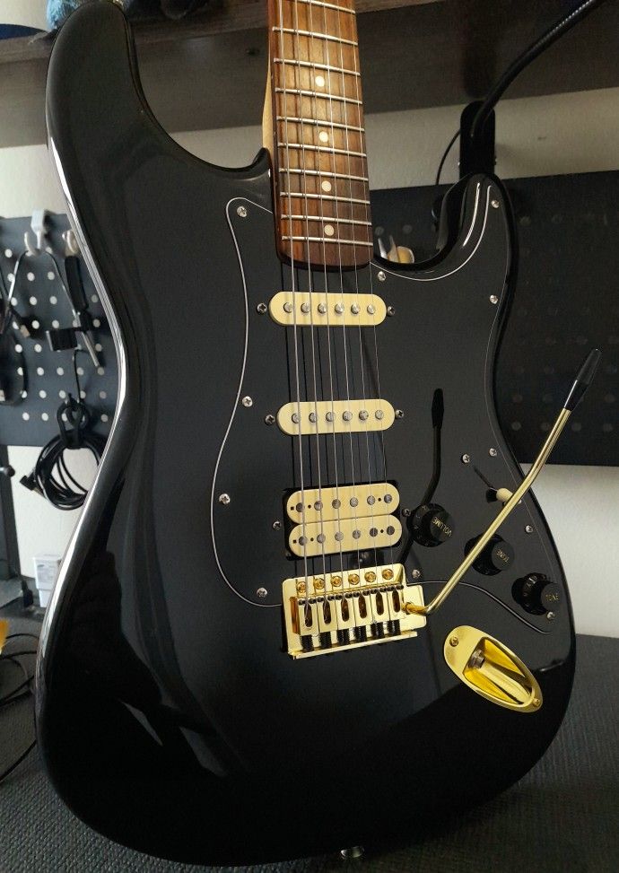 Fender Squier Affinity Strat Black electric guitar.