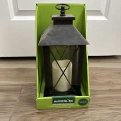 Lantern with flameless pillar candle