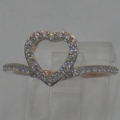 10KT ROSE GOLD RING 2.2 GRAMS WITH 40 DIAMONDS 0.33 TOTAL SIZE 7. 886423-1