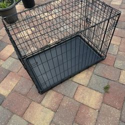 Cage For Dogs Or Cats 19 Inches Wide,30 Inches Long And 21 Inches High.