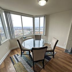 Glass Dining Table + 4 Chairs – Excellent Condition (Free Rug Included!)