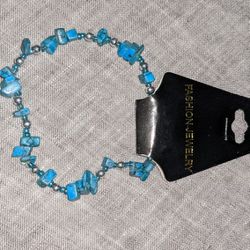 Brand new stretchy blue stone bracelet.

