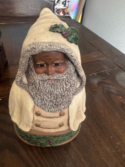 M. Holcombe 11 inch black Santa statue