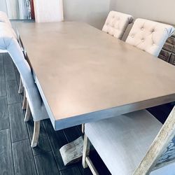 Concrete and distressed oak dining table with 6-linen chairs