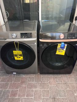 Stainless steel front load washer and Electric dryer Like New