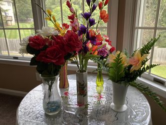 Flowers with vase $12 each