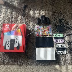 Nintendo Switch - OLED Model with White Joy-Con