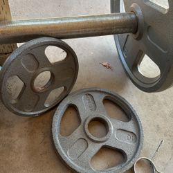 45 Pound Barbell along with , 2 (35 Pound Plates) 2 (10 Pound Plates) 2 (5 pound Plates). 