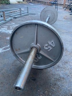 Half Cage, Olympic Bar, and two 45lb. Plates