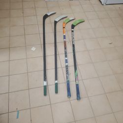 Pack Of 4 Hockey Sticks