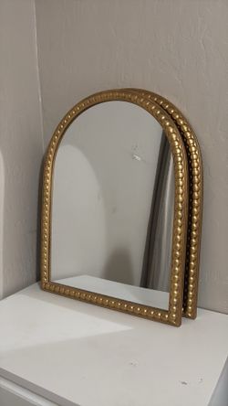 Gold mirror