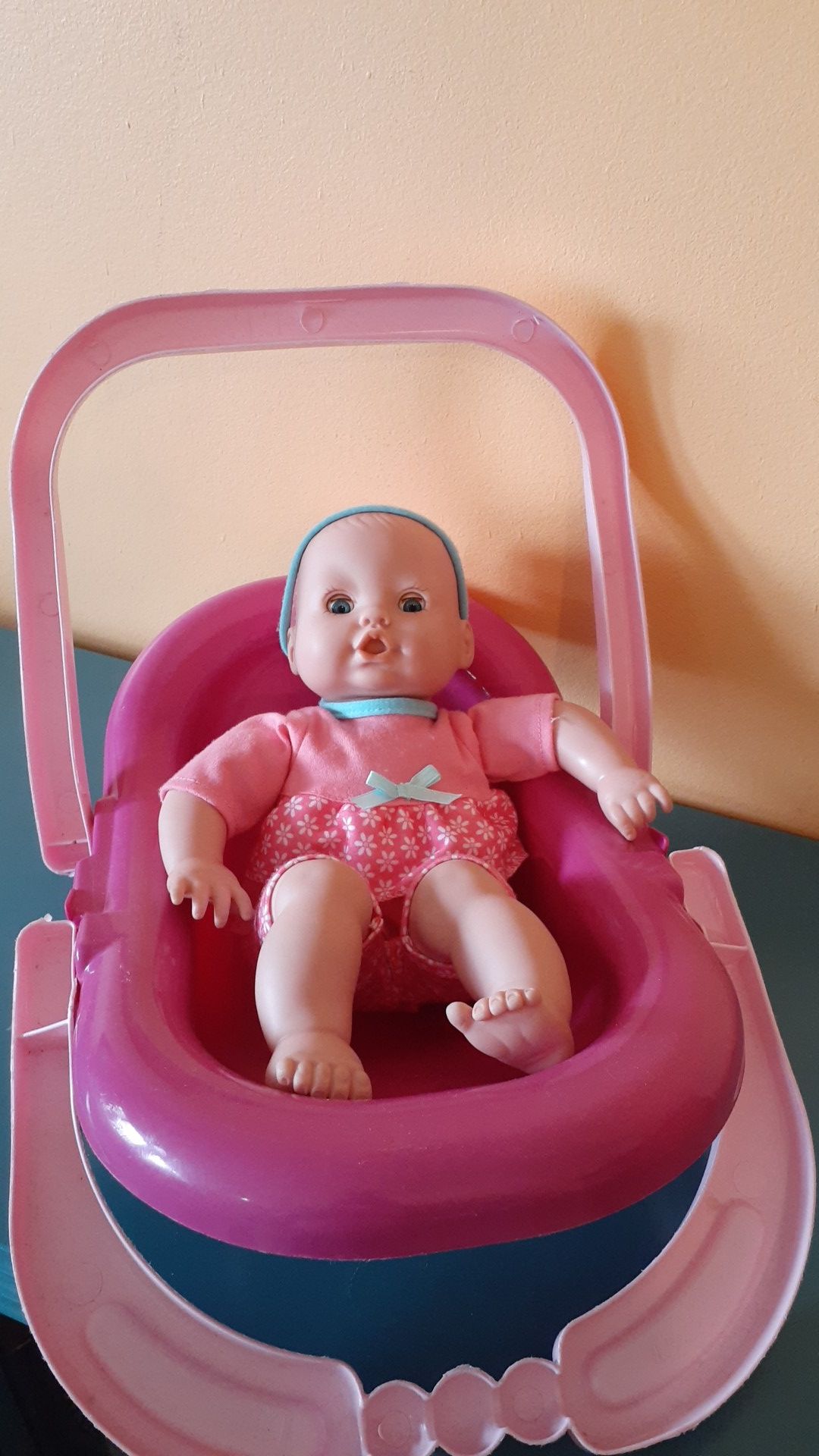 Baby doll 9" with carrier.