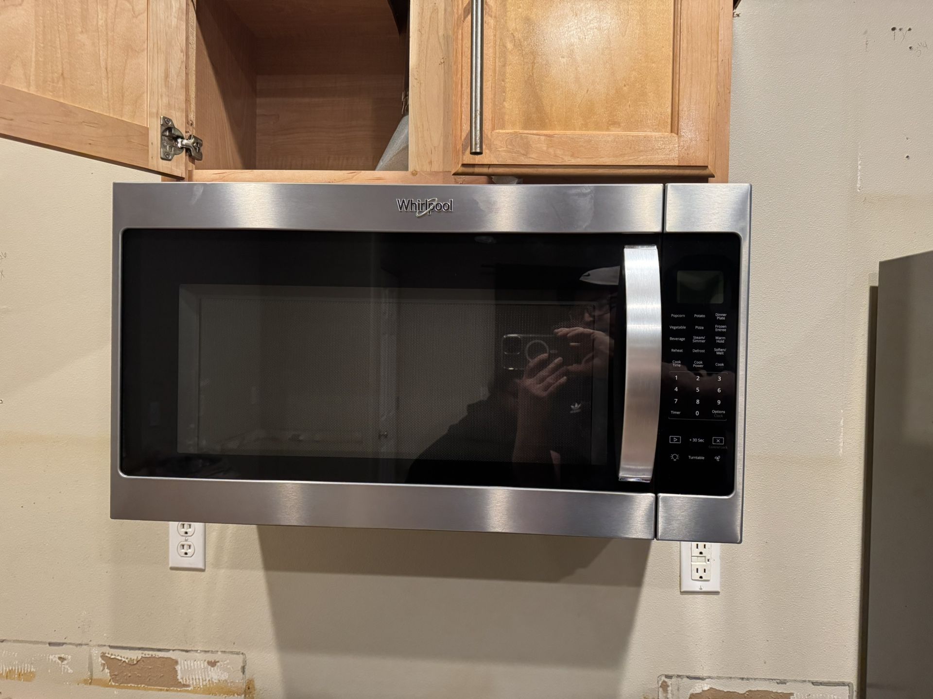 Whirlpool 2.1-cu ft Over-the-Range Microwave - $100