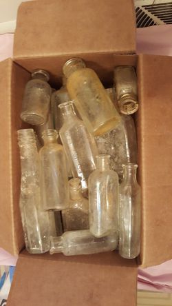 Box of antique bottles