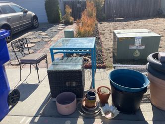 Free pots ..chicken wire for gardening ..tomatoe cages ..small patio table and another smalll patio table with 2 chairs ..free blueberry circle Oceans
