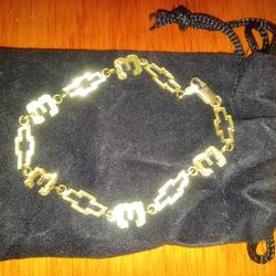 Dale Earnhardt gold bracelet with number 3 and Chevy logo.