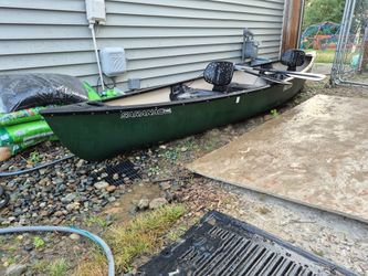 OldTown Saranac 146 with paddles and roof mounting kit