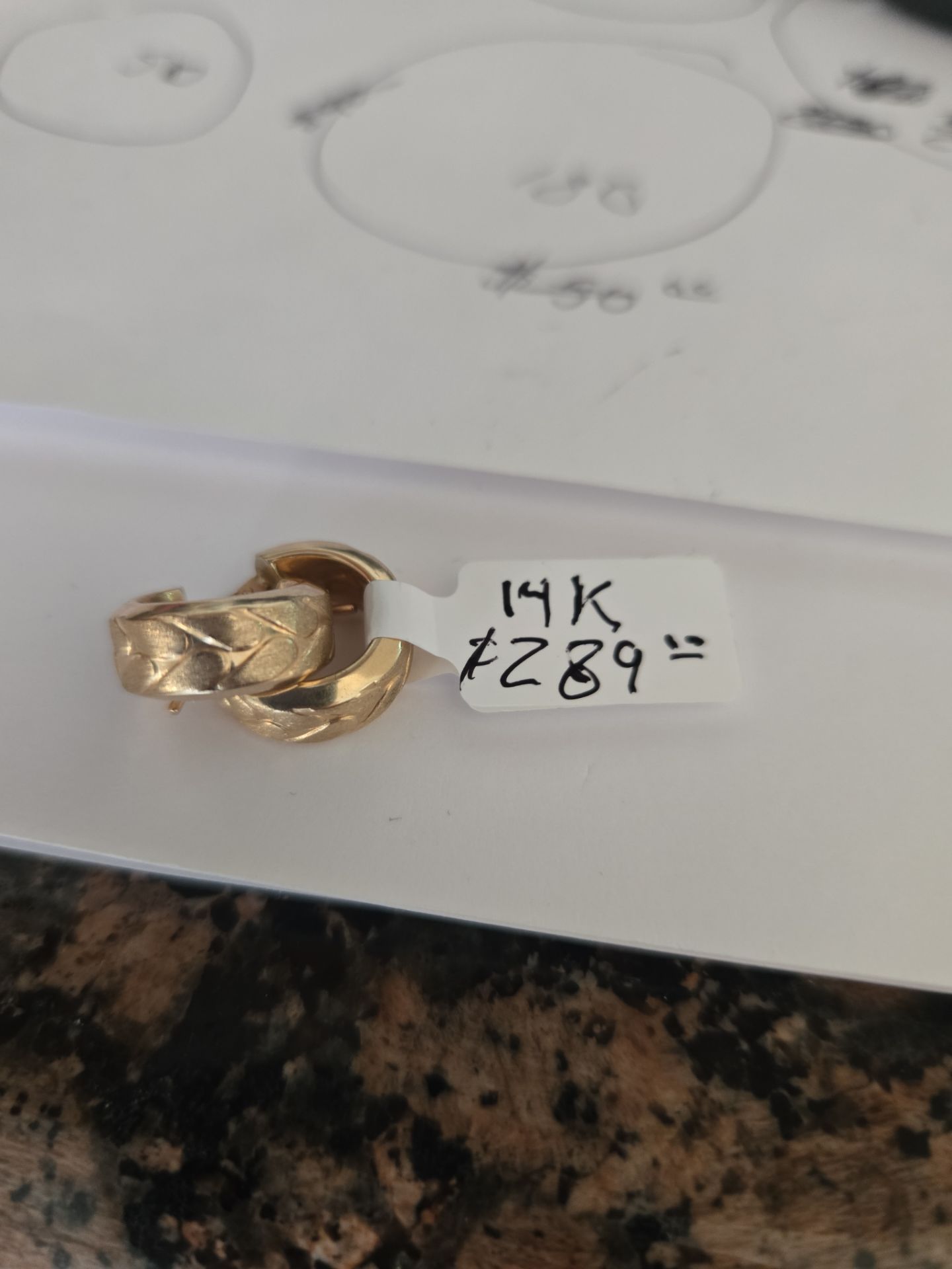 Elevate your jewelry game with these stunning solid 14K yellow gold huggie hoops. These aren't your average thin hoops—they feature a wide, domed prof