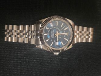 MEN'S ROLEX  STAINLESS STEEL SKY DWELLER "BLUE FACE