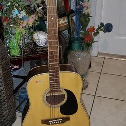 CARLOS ROBELLI ACOUSTIC GUITAR AND BAG 