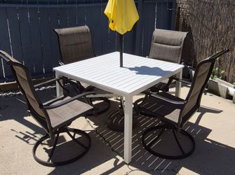 Patio table with 4 swivel chairs