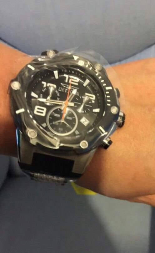 Men's Invicta Watch new in box retails for over 335.oo