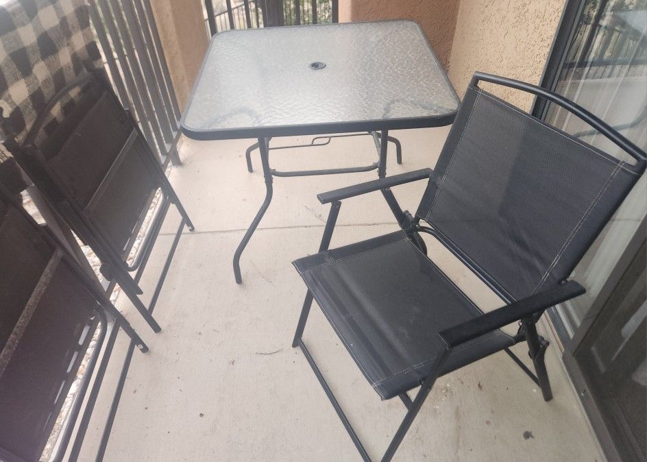 Patio Table With 4 Matching Folding Chairs