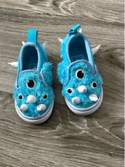 VANS OFF THE WALL MONSTER TODDLER SLIP ONS.