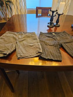 2 pairs of Men's shorts Size 32