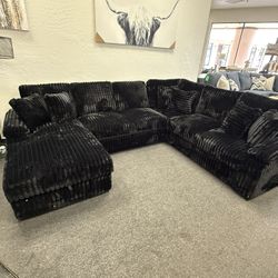 Sectional In Black Corduroy With Sleeper With Storage Chaise 