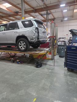 Auto body frame rack