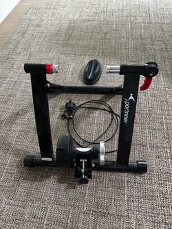 Indoor bicycle trainer