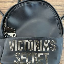Victoria's Secret Mini  Love Victoria 7" Backpack Black w/ Gold Color Details. Condition is pre owned and shows some light signs of wear from usage an