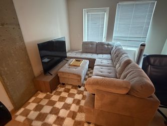 Costco Light Brown chenille sectional couch and ottoman