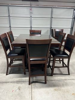 Extendable counter height dining set