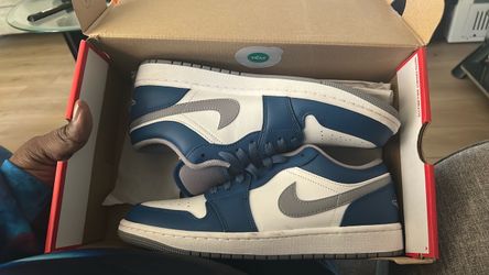 e Air Jordan 1 Low "True Blue Cement" (Style Code: ⁠553558-412⁠).