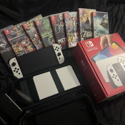 NINTENDO SWITCH AND GAMES BUNDLE 
