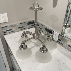 Brushed Nickel Chandelier with Frosted Glass.