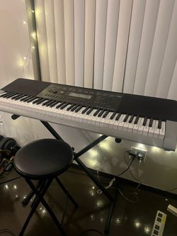 Casio WK-240 Keyboard with stand