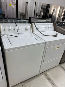 Kenmore top load washer and electric dryer set