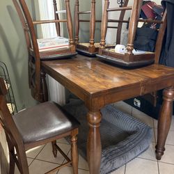 Table 4 Chairs And Tall Bottle Console 
