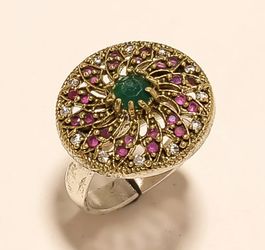 Adjustable emerald, ruby, and topaz in sterling silver ring