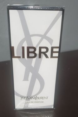 Yves Saint Laurent  New  and 2 box dolls and new starbuck can all for $140
